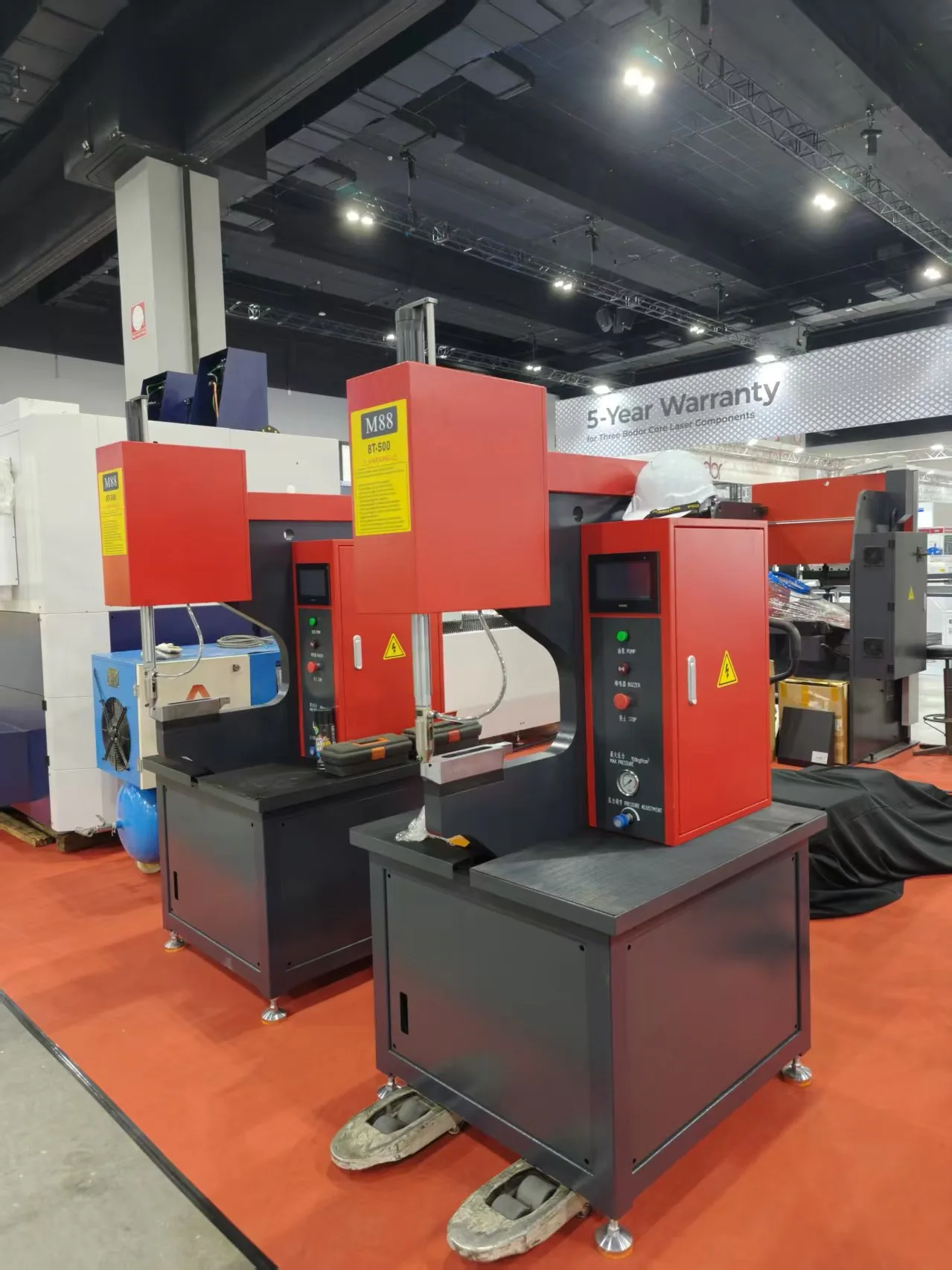Hydraulic riveting machine displayed at industrial exhibition